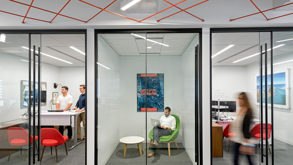 A group of people in an office.